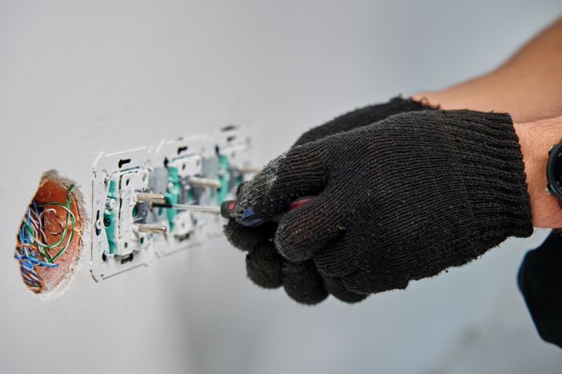 Technician Installing Wiring